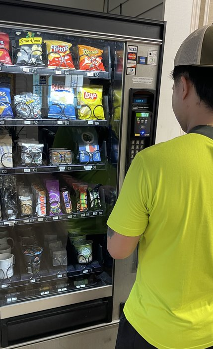 Crew member checking out at the vending area