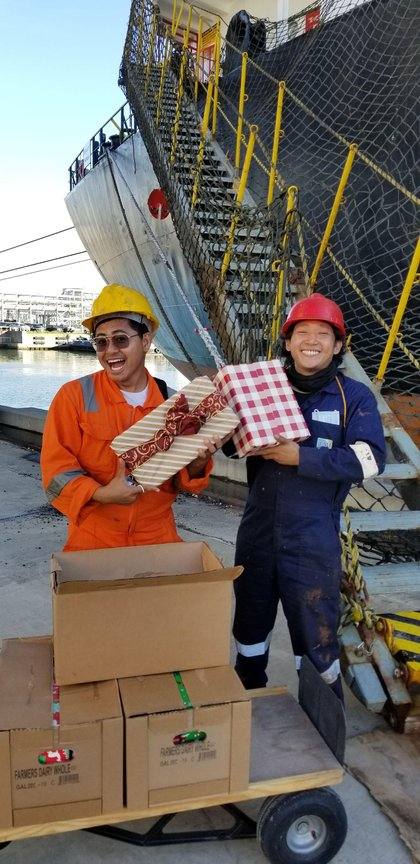 A crew member relaxing on a ship deck